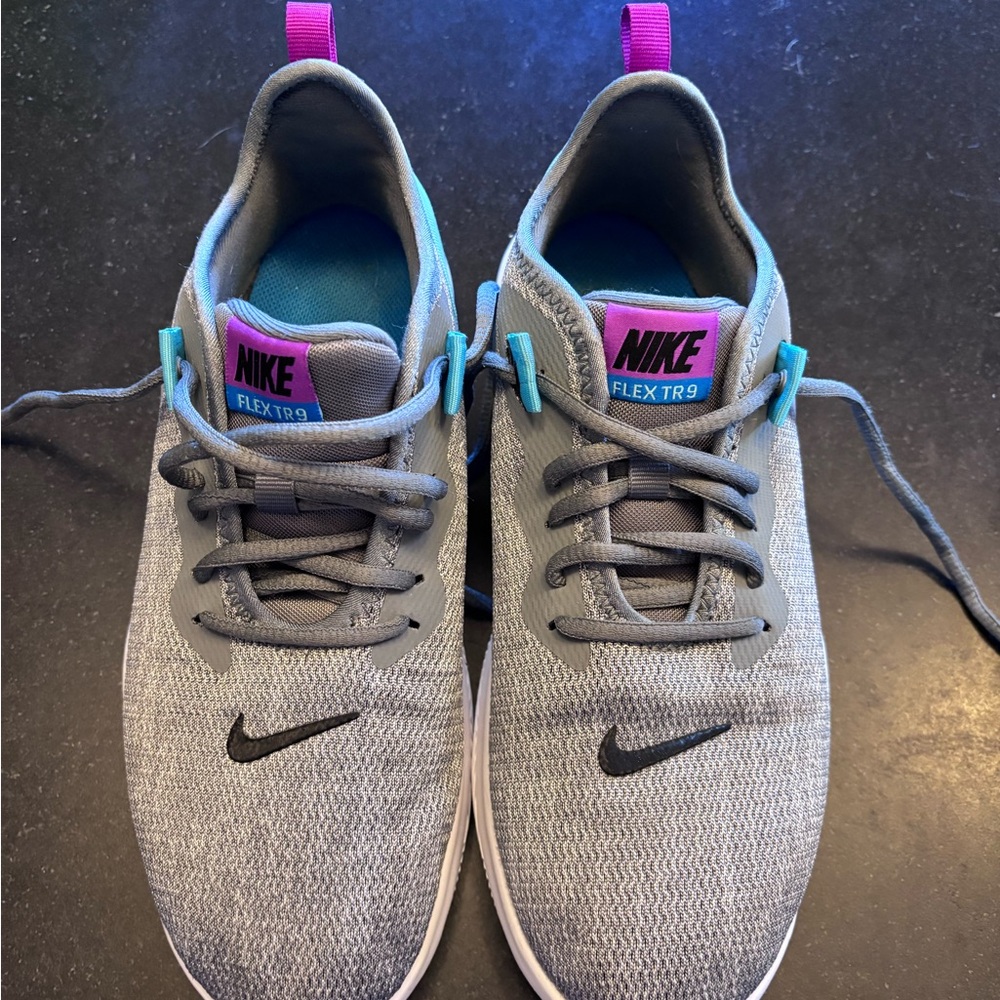 Nike Gray and Pink Athletic Shoes with Modern Silhouette